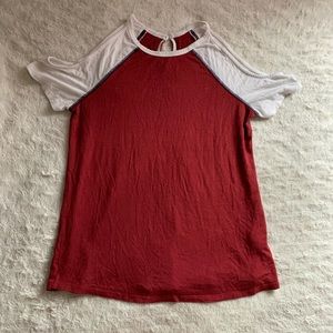 Red and white shoulder showing T shirt